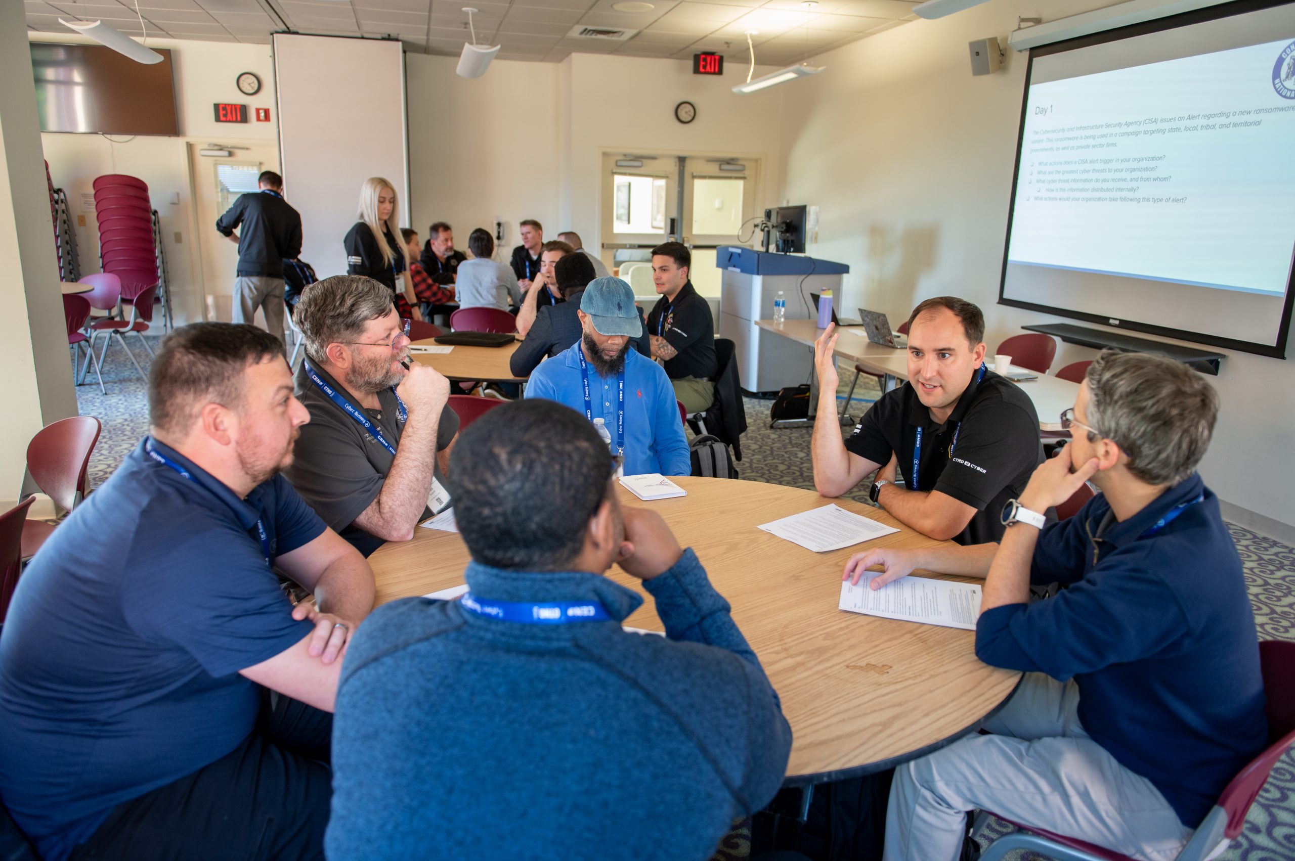 People discussing a topic around a table