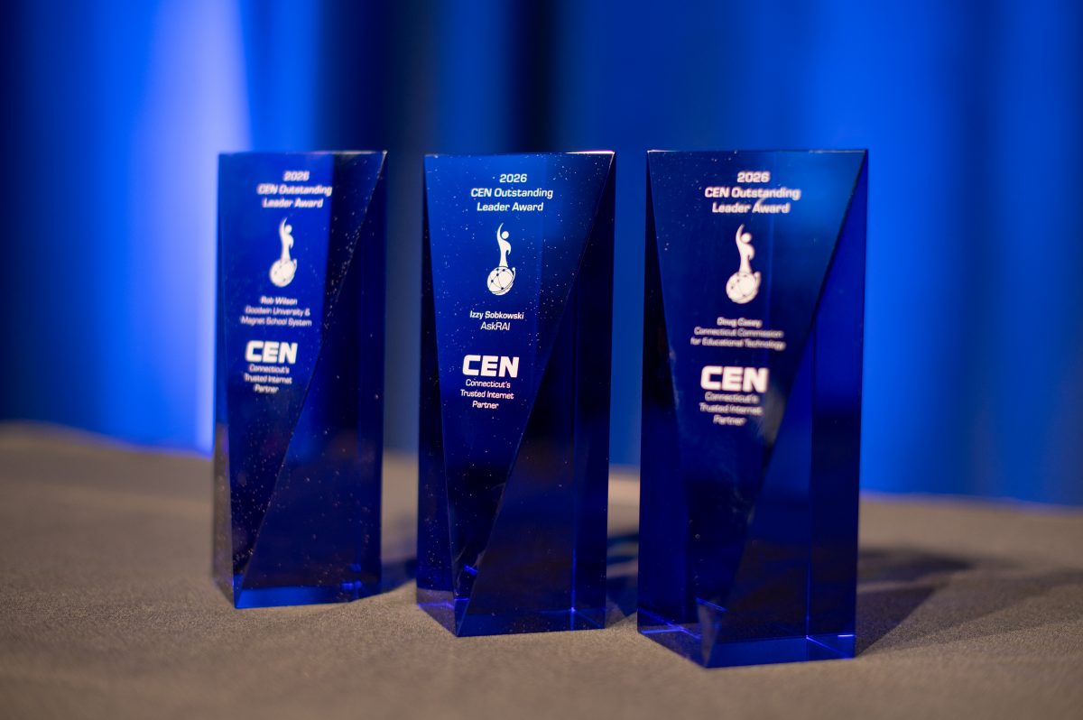 Three COLA awards from the 2026 Conference placed on a table